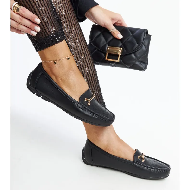 Black moccasins with decorative buckle