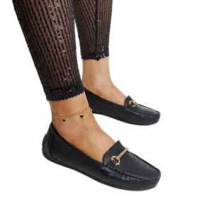 Black moccasins with decorative buckle