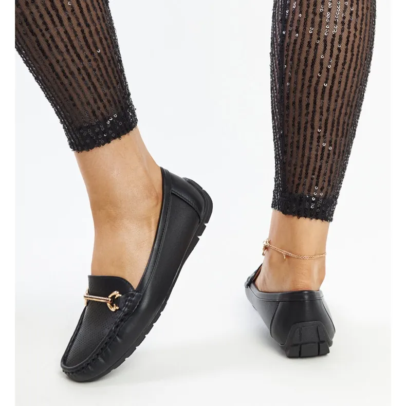 Black moccasins with decorative buckle