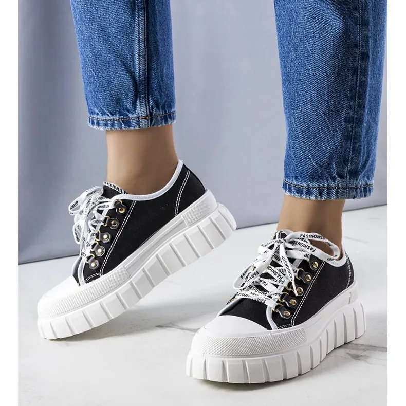 Black platform sneakers from Toni