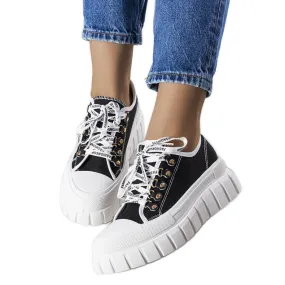 Black platform sneakers from Toni