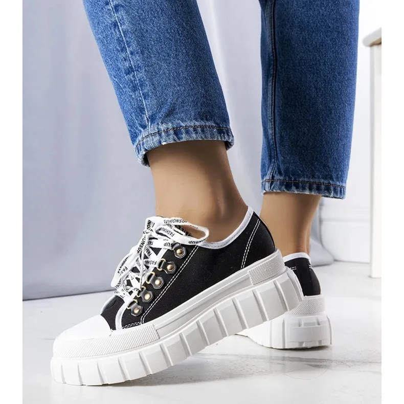 Black platform sneakers from Toni