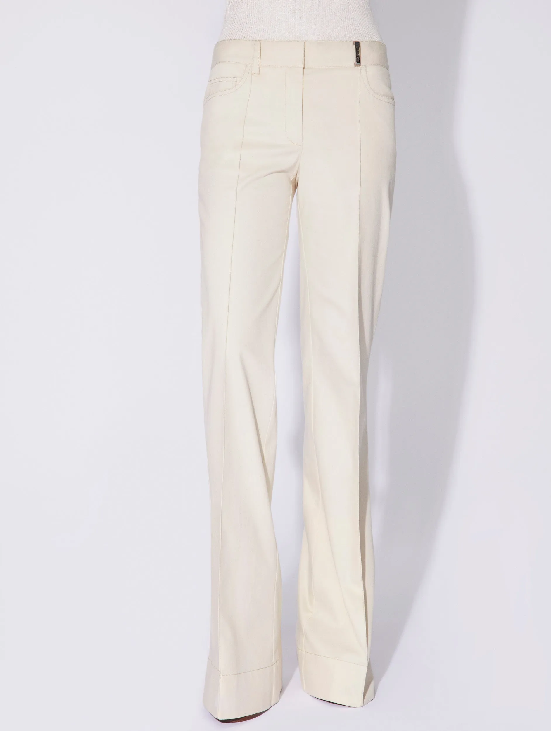 Cream washed denim flared trousers