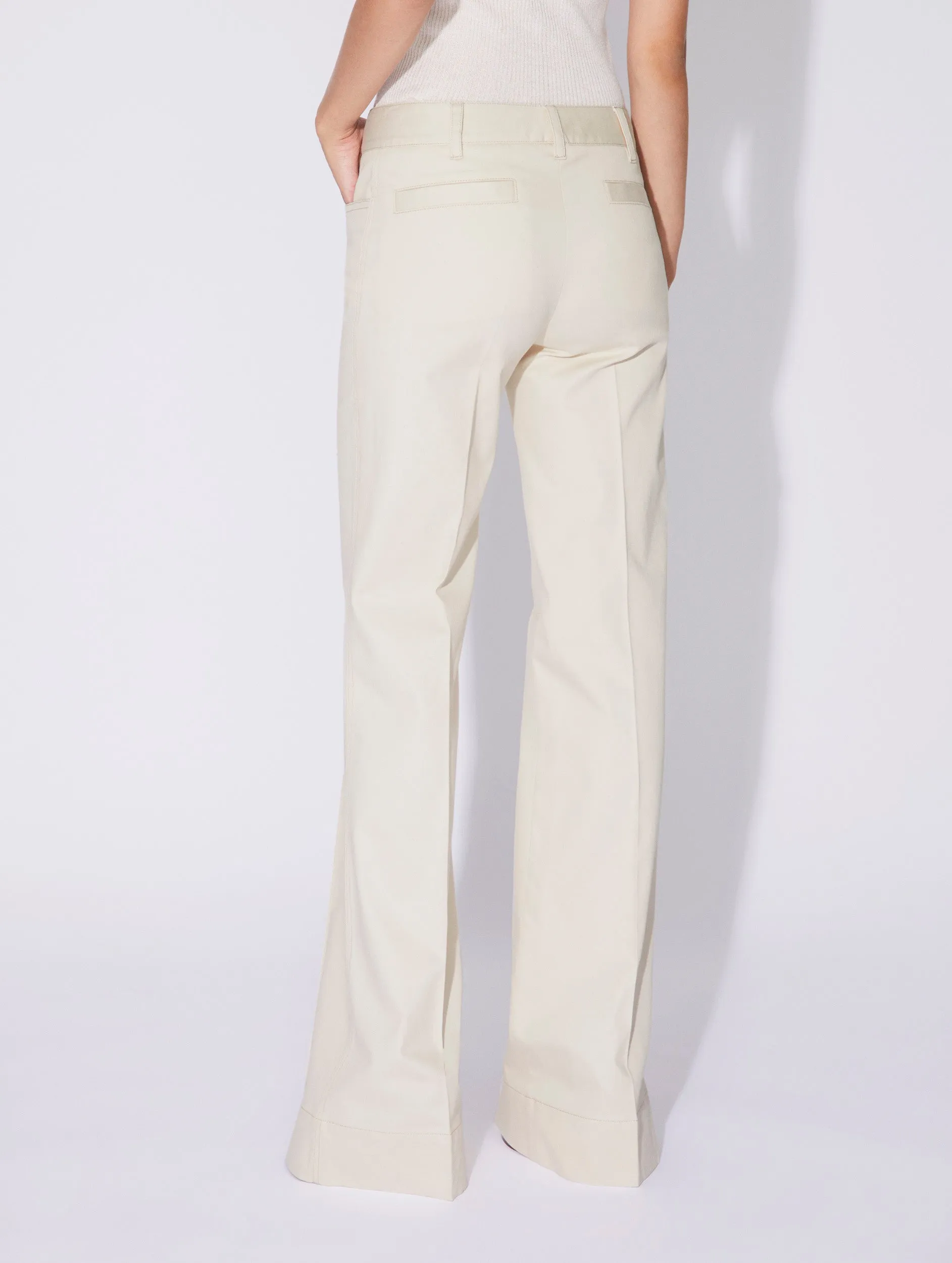 Cream washed denim flared trousers