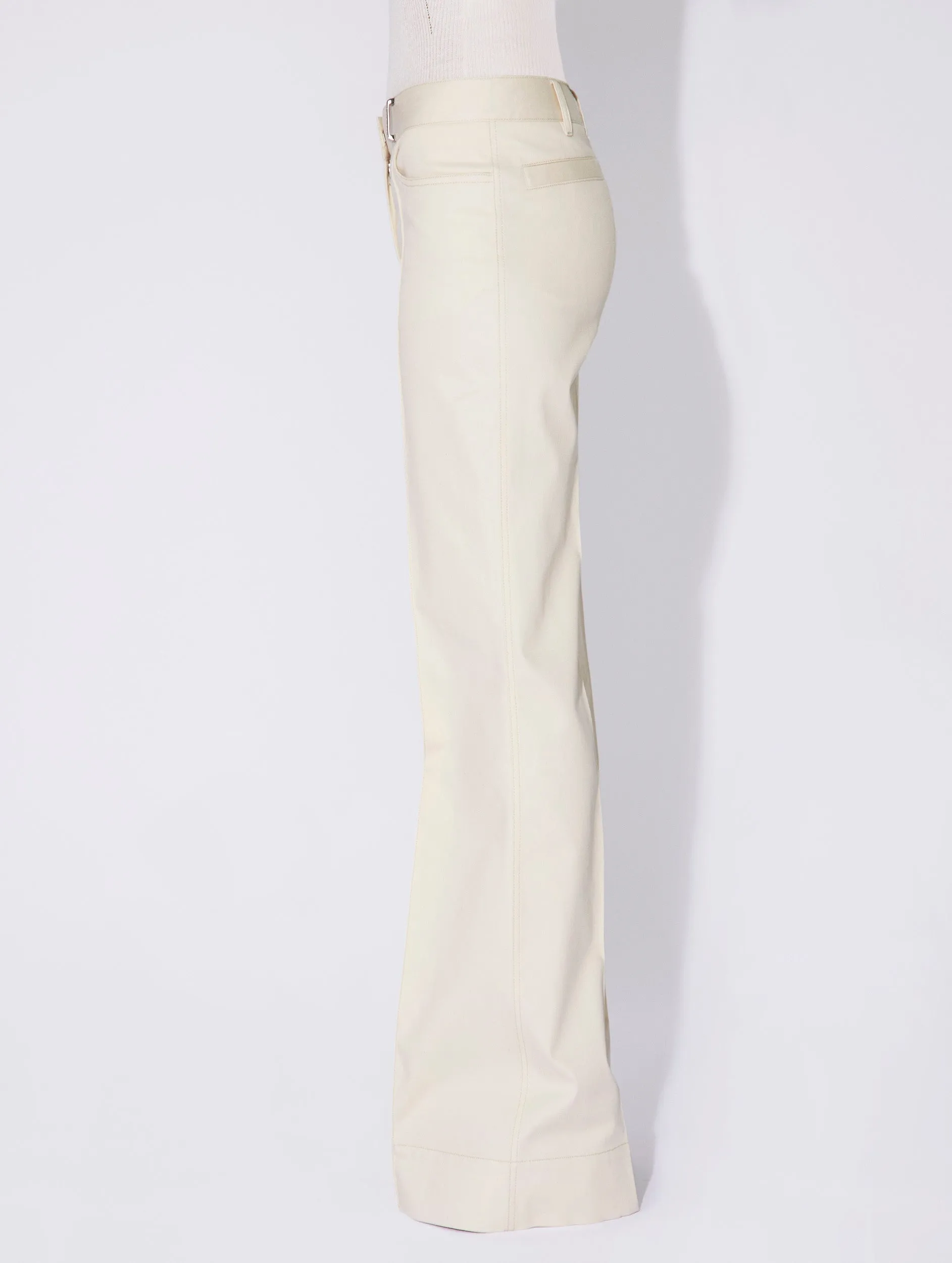 Cream washed denim flared trousers