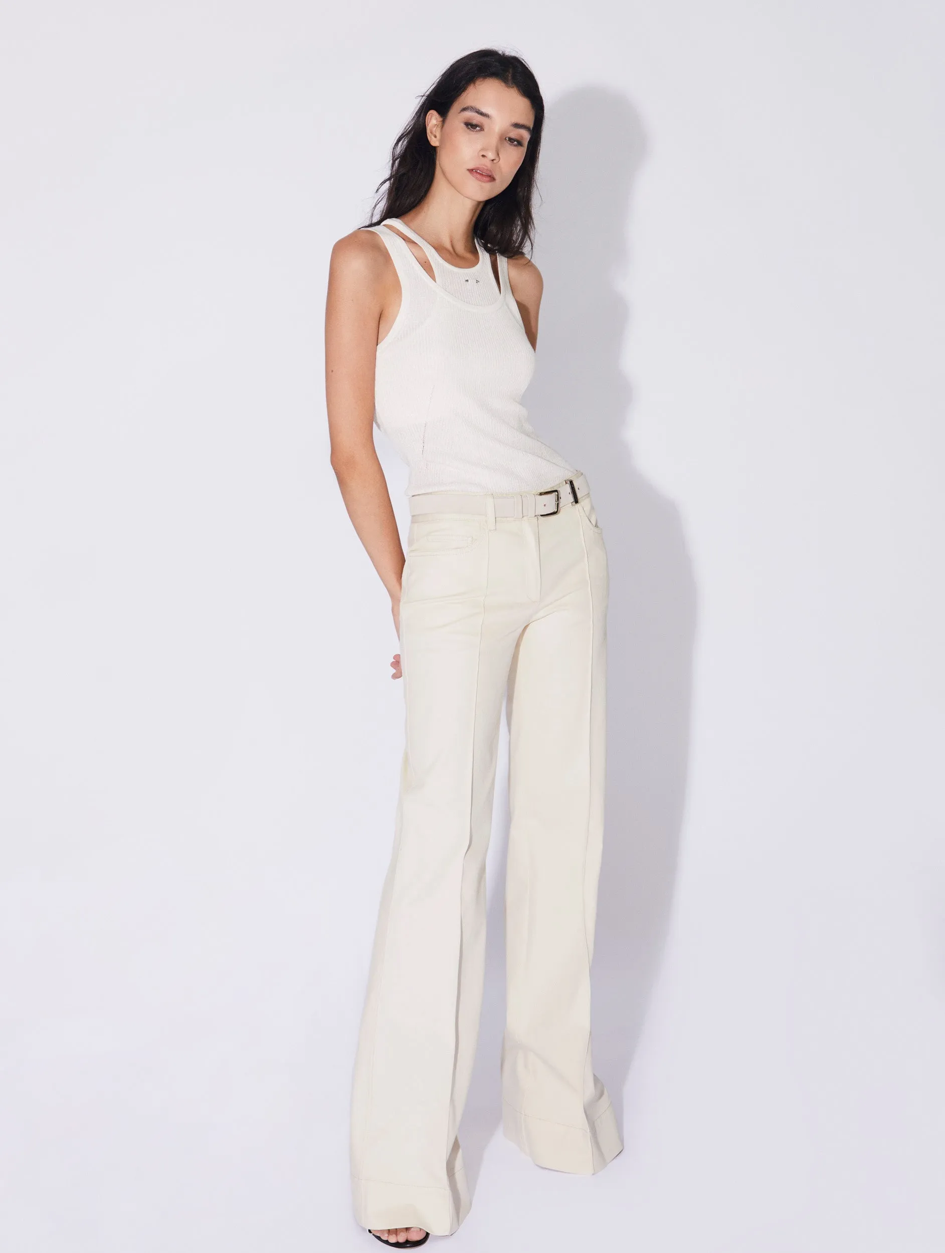 Cream washed denim flared trousers