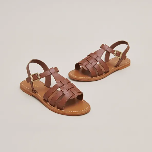 Flat braided sandals in cognac leather