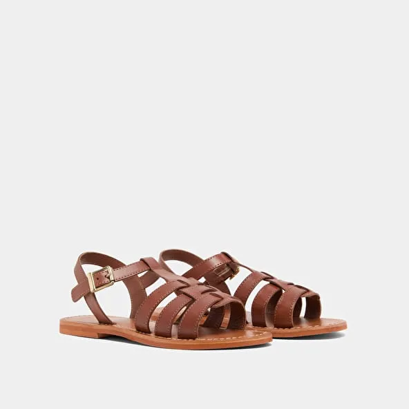 Flat braided sandals in cognac leather