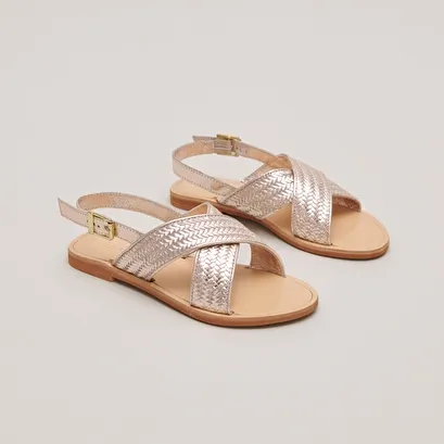 Flat sandals with broad straps in platinum metallic leather