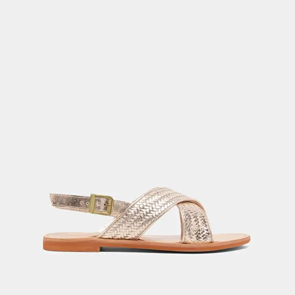 Flat sandals with broad straps in platinum metallic leather