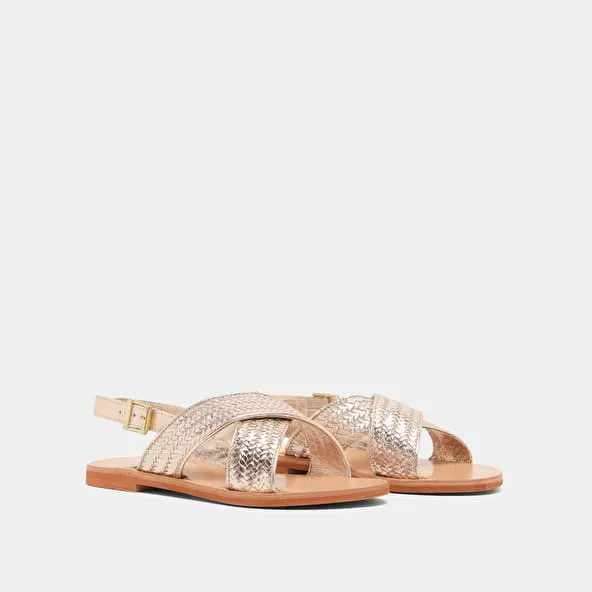 Flat sandals with broad straps in platinum metallic leather