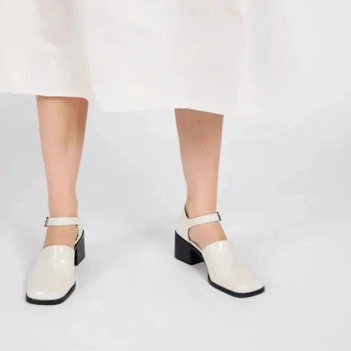 IB MARTY PATENT MARY JANE HEELS IN WHITE