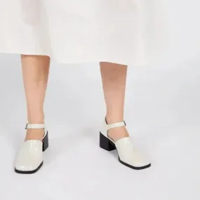 IB MARTY PATENT MARY JANE HEELS IN WHITE