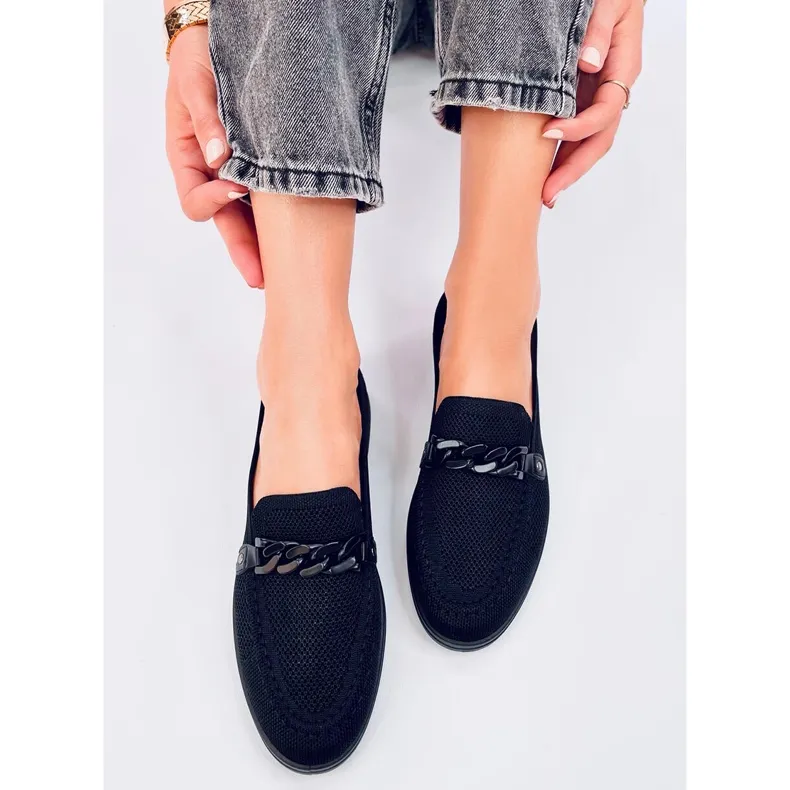 Lucena Black cutout loafers.