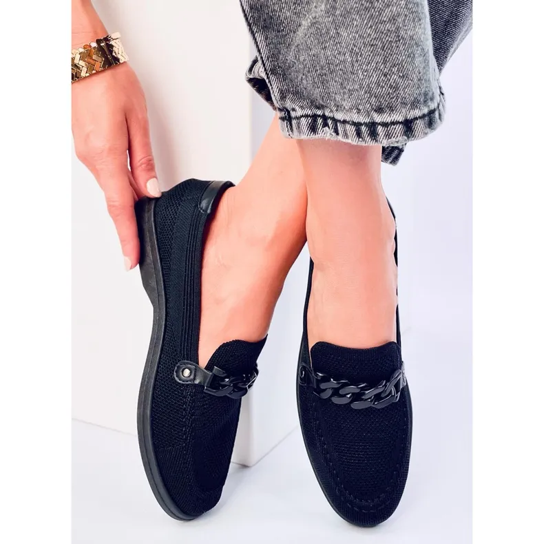 Lucena Black cutout loafers.