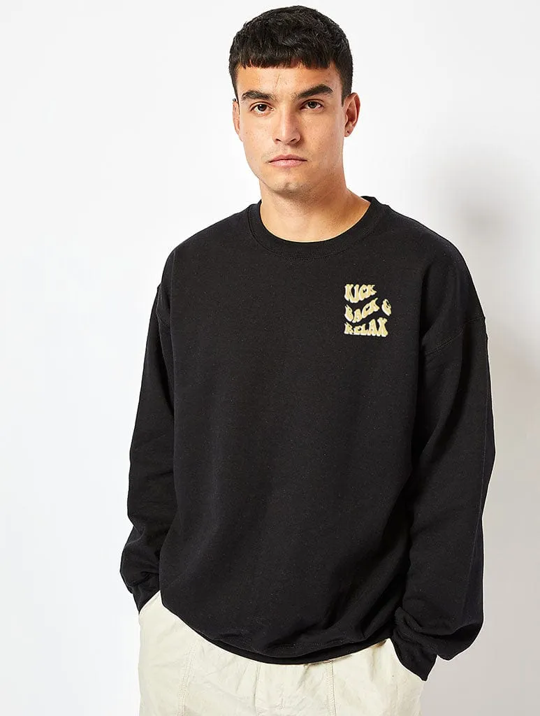 Peanuts x Skinnydip Snoopy Kick Back & Relax Sweatshirt in Black