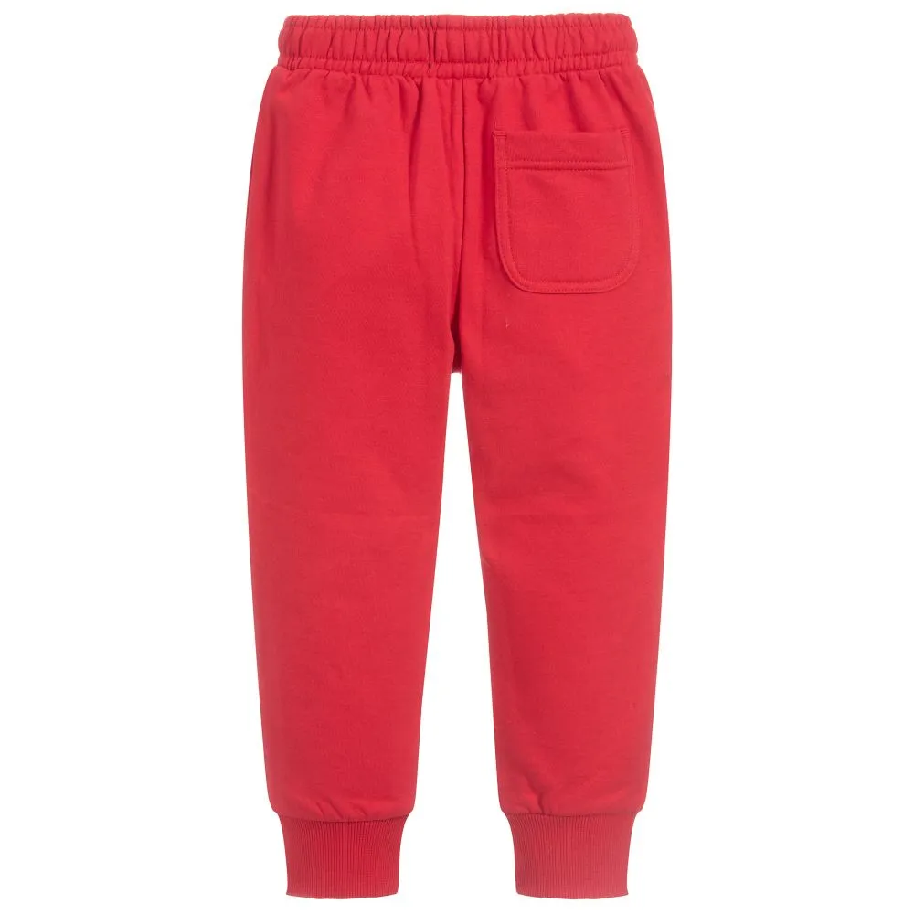 red cotton pants