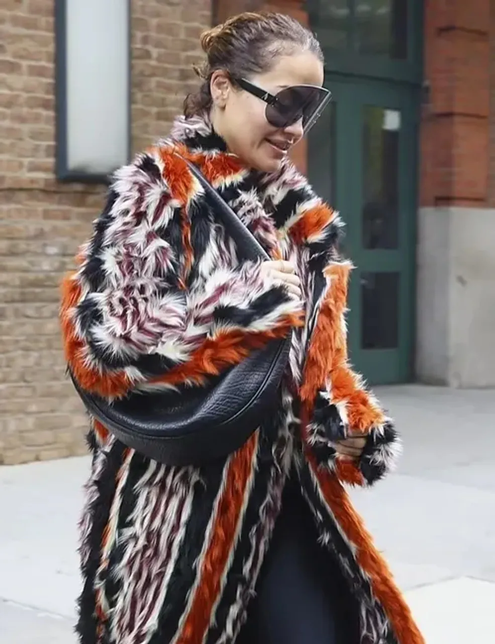 rita ora 2024 met gala orange coat