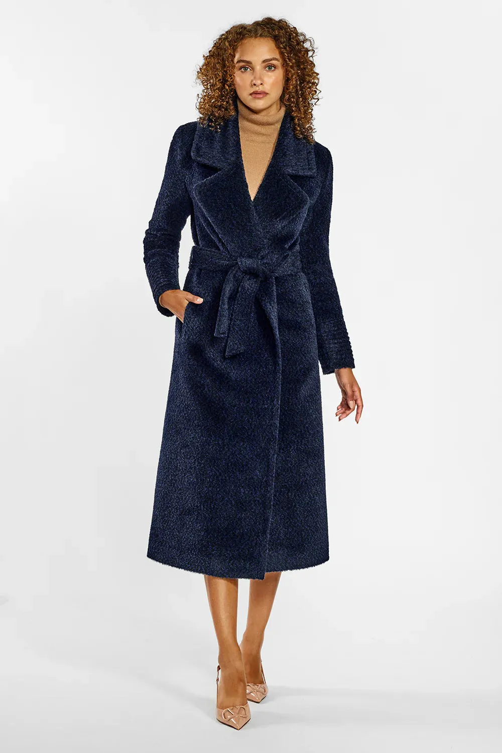 Sentaler boucle coat with long notched collar.