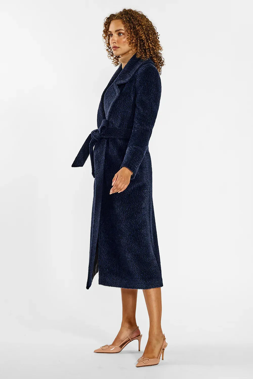 Sentaler boucle coat with long notched collar.