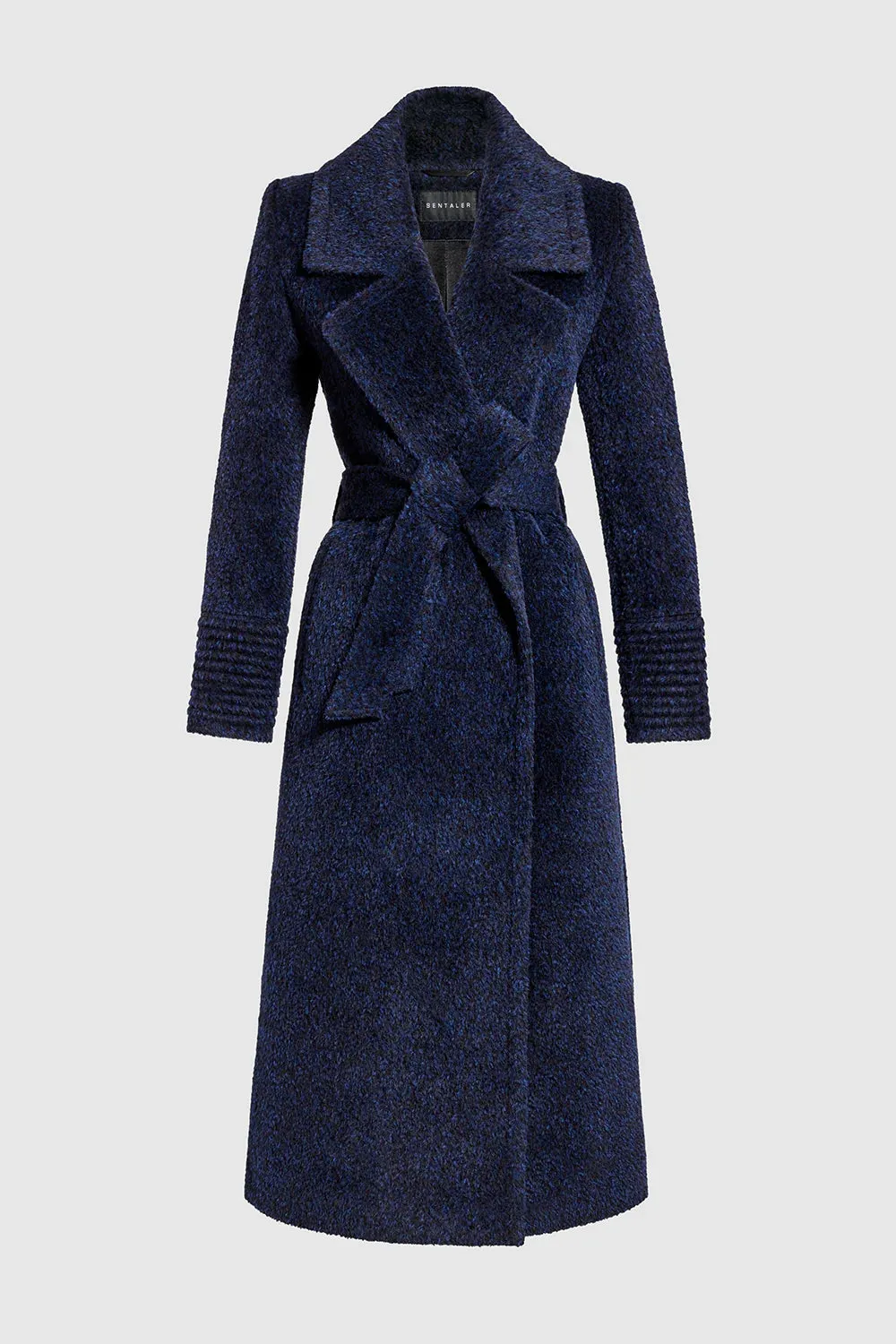 Sentaler boucle coat with long notched collar.