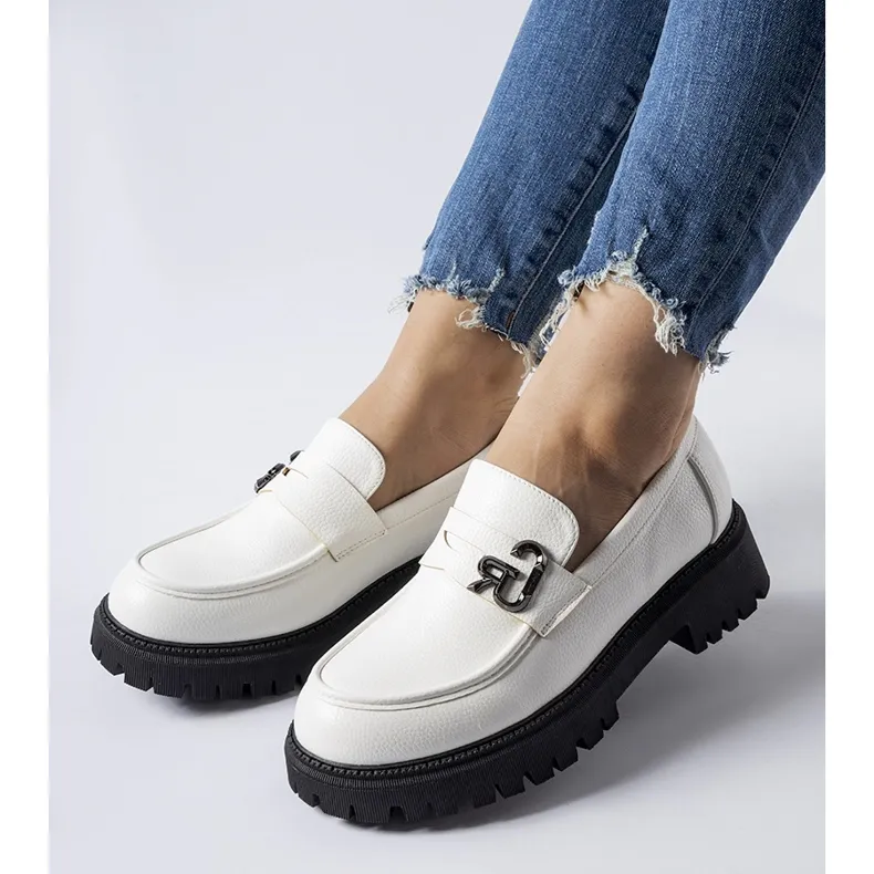 White and black moccasins with buckle