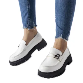 White and black moccasins with buckle